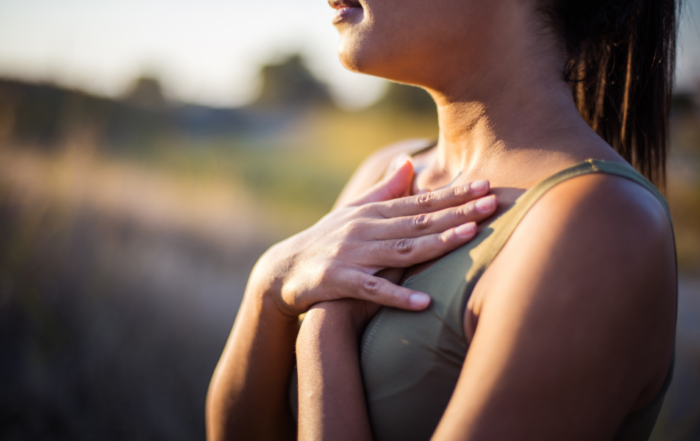 A woman practicing the power of conscious breathing