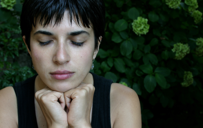 young woman in reflective mood